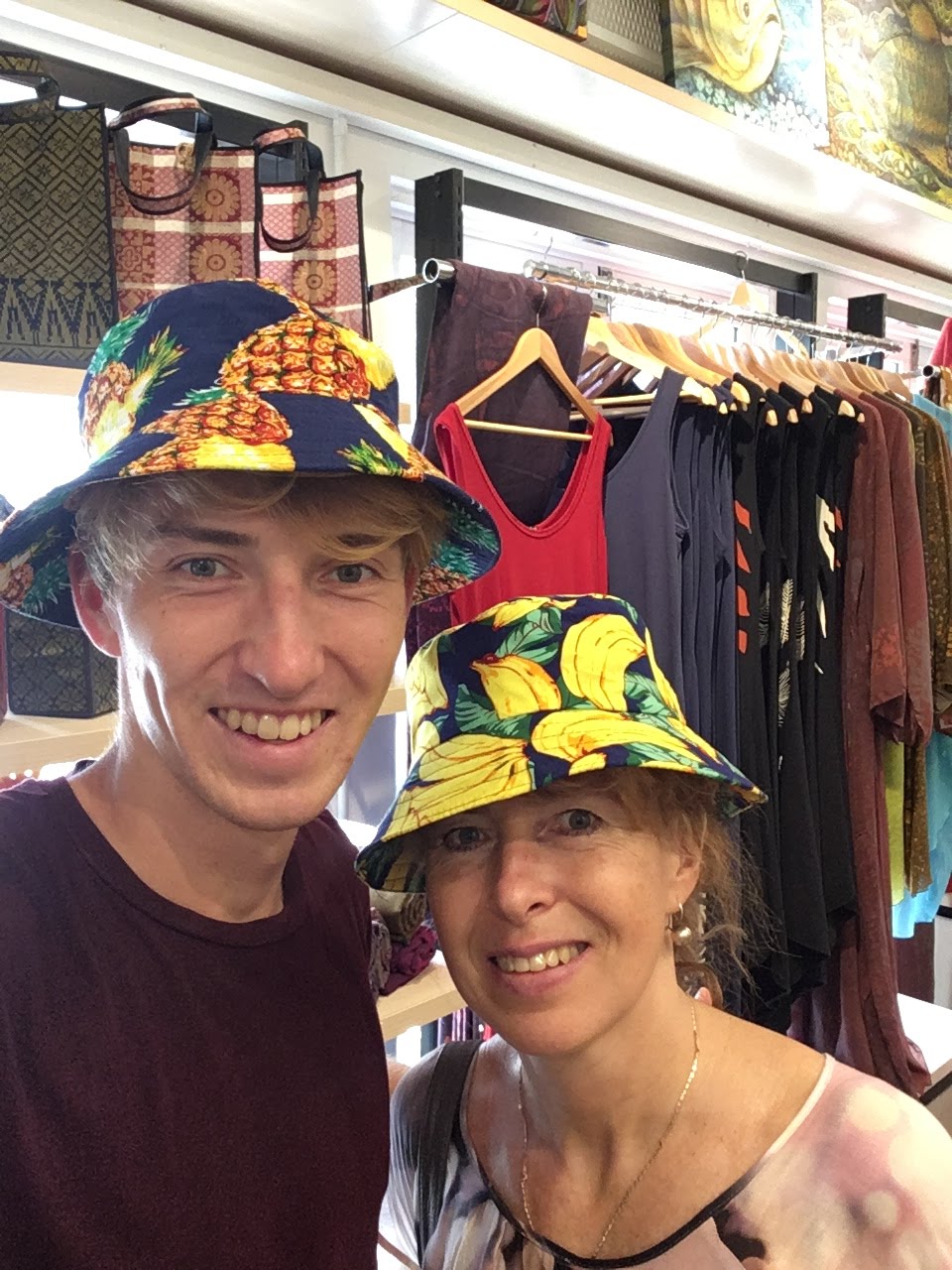 Wearing fruit hats together with my mom